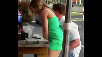 A Couple Engages In Intimate Encounter In A Public Place