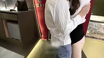 Young Asian Woman Discovers Coworker'S Impressive Member And Initiates Sexual Advances In Doggy Style