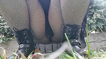 A Woman In Fishnet Stockings Exposes Herself And Urinates In A Public Park For Your Viewing Pleasure